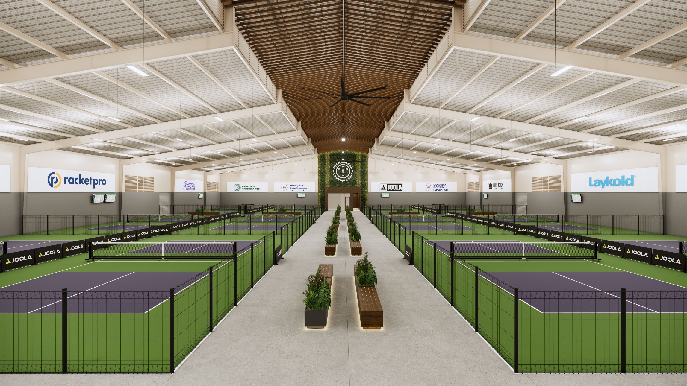 Pickleball Federation main court hall with the Cambodia Pickleball Federation crest, racketpro, Laykold, and JOOLA partners.