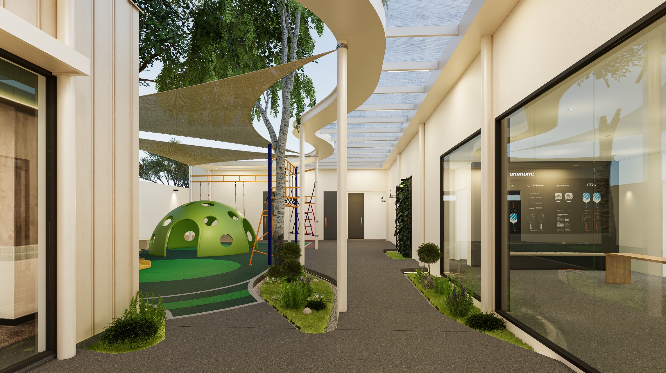 TheCommune family area approach with shade sails and play structures.